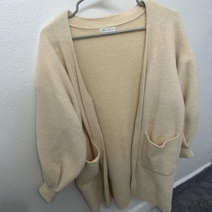 Mid length cream color cardigan only worn once